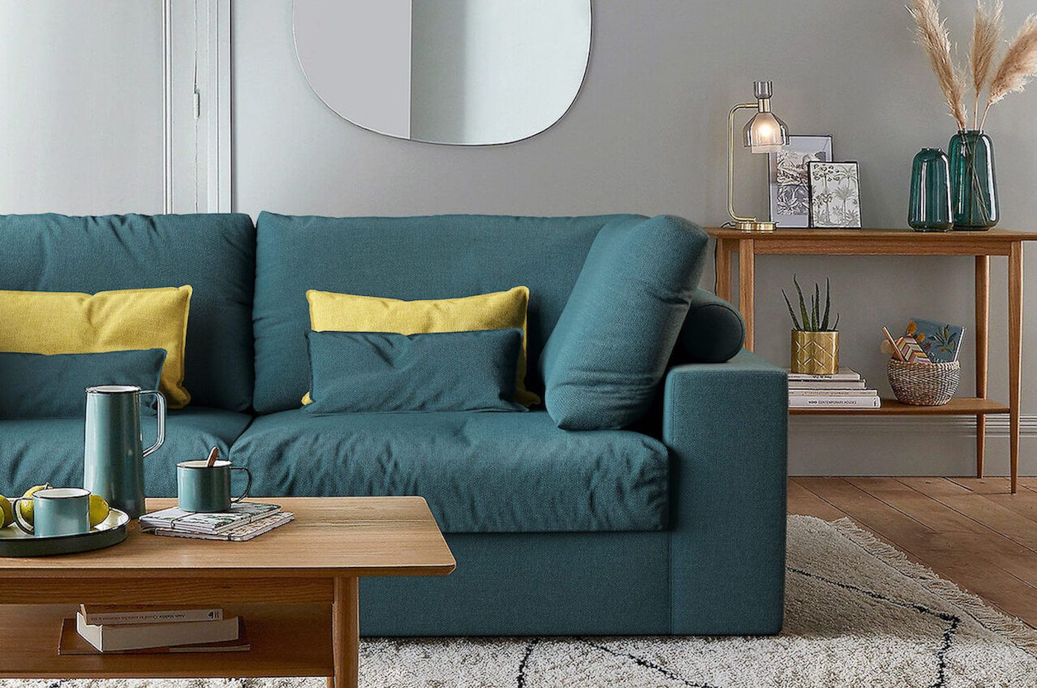Зеленый диван в интерьере: как выбрать и с чем сочетать